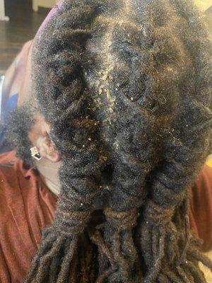 The style she thought i wanted plus my scalp that is dry to her not washing it prior to her added more product this is after 2 days