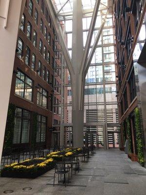 Street level atrium with neat falling water art work / sculpture