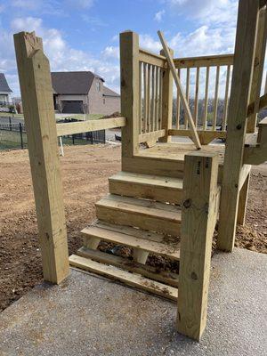 Deck stair railings are not complete.