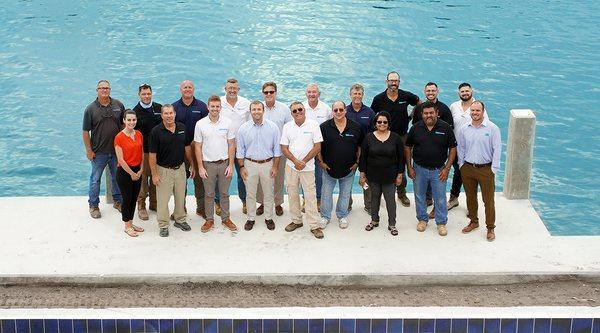 Group team photo on the dock.