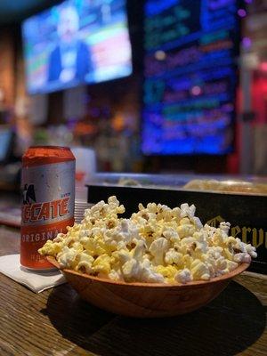 $3 before 7p Tecate can and $0 popcorn.