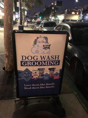 Sign depicting City Dogs Business