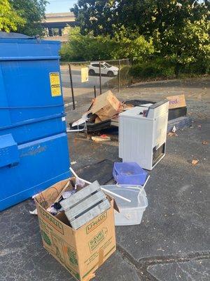 The trash grows as Public Storge locks their dumpster.