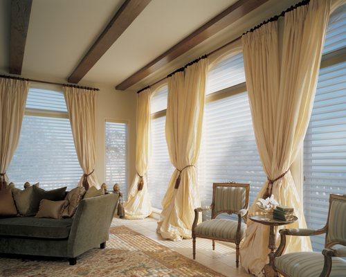 Beautiful silk drapes over Hunter Douglas Silhouettes.  The companion to Silhouettes are Luninettes.