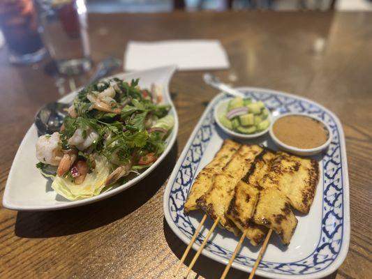 Chicken Satay and green salad with prawn