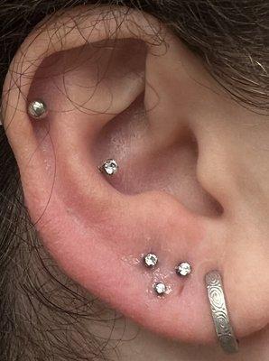 New stacked/constellation lobe piercings. Healing conch & cartilage