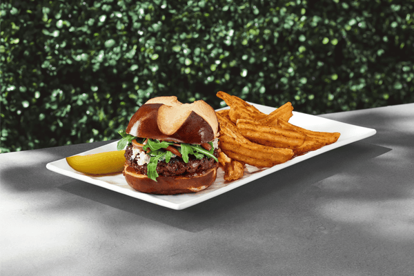 Box Office Burger on Pretzel Bun with Potato Wedges