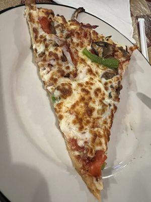 First slice of our Supreme pizza.