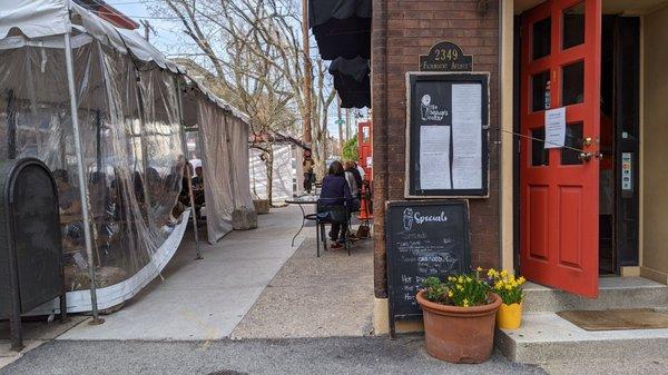 Outdoor dining - use the red door here for takeout or the side door for seating!