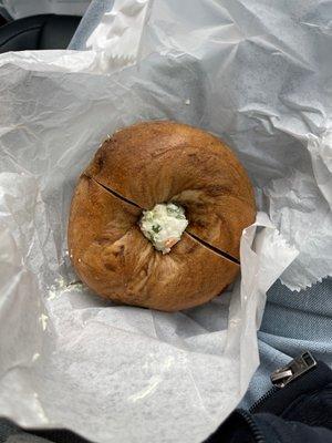 Cinnamon raisin bagel with veggie cream cheese