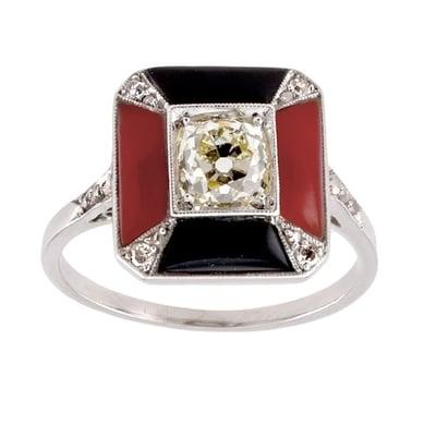 Art Deco coral, diamond and onyx ring.