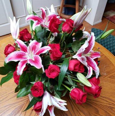 Red Roses accented with Stargazer Lilies