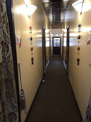 Hallway, massage rooms on both sides