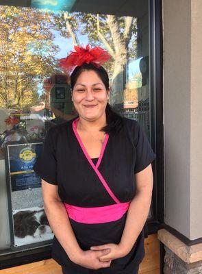 Hat day at A Fur Affair. Our awesome groomer Marissa always has a smile.