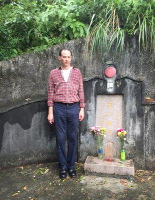 Our teacher, David Robinson, at the grave of Ip Man in Hong Kong.