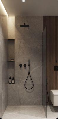 A minimalist haven with raw elegance, merging modern aesthetics for a uniquely tranquil bathing experience.