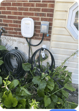 The charging station outside of the house.