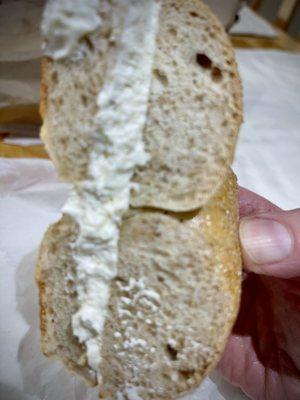 Whole wheat bagel with light cream cheese