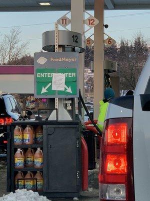 This is their way of informing the public that they no longer will reach the hose around if your gas fill is opposite the pump!