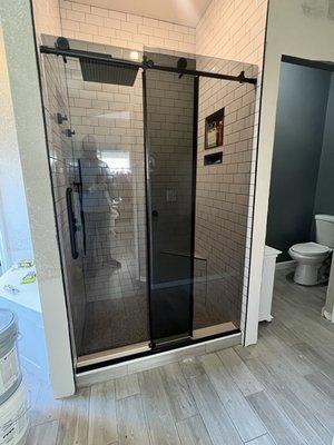 Bathroom remodeling, Shower glass doors, tile, toilet and vanity installation