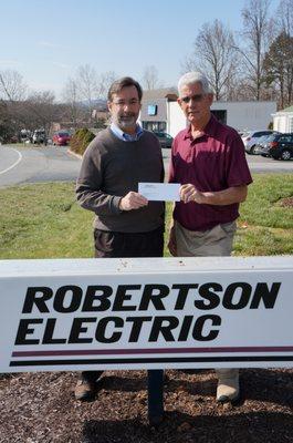 Presenting a check to Blue Ridge Area Foodbank