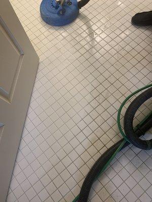 Bathroom tile cleaning.