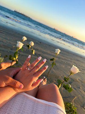 Engagement photo with hand for size