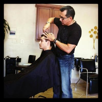 The one and only, Ricardo cutting my hair.