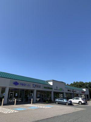 Outside--in a plaza so ample parking