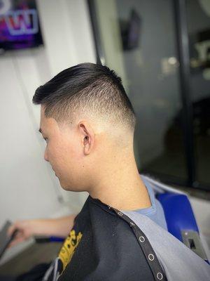 Mid drop fade @odysseybarberstudio