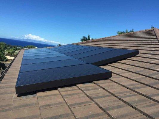 SolarWorld black modules, roof mount in Wailea Golf Estates with Enphase.