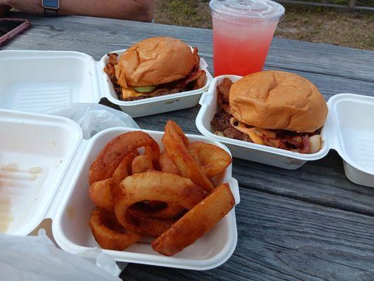 Onion rings, burger and strawberry lemonade.