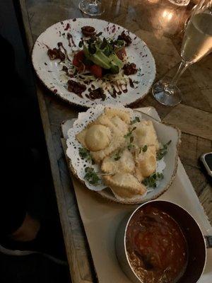 Valentine's prix fixe.  1st course.  Ravioli with ricotta filling and tomato dipping sauce.