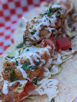 The grilled fish tacos have just the right amount of spice and flaky moist fish.