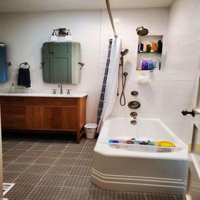 Phinney Ridge Bathroom Remodel.  The existing tub had a unique 45 degree angle on it which worked well for the layout.