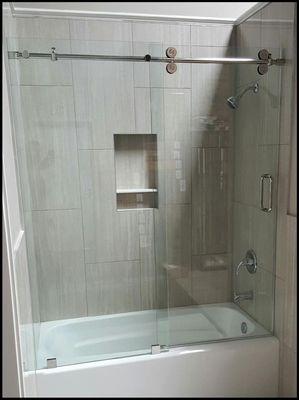 Porcelain tile with new tub and Euroglide Glass Sliding Door