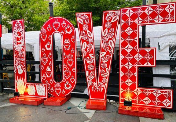 L O V E letters out front of the restaurant.