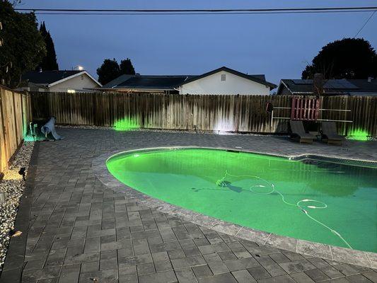 Night view of the pool with colored lighting