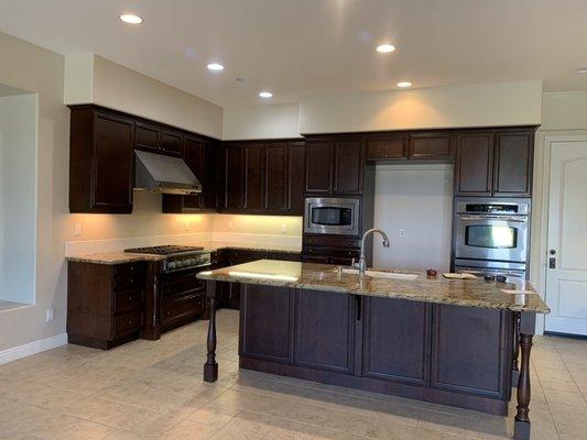 Refinishing kitchen cabinet's and granite counter tops