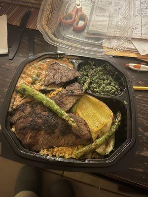 This steak dinner platter is unbelievable. Has such great flavor. Got some extra cilantro on the beans that's a must have.