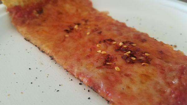 Cheese pizza with pepper flakes