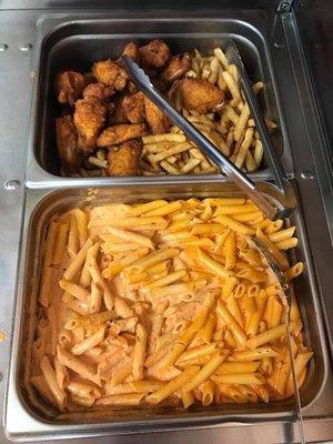 Chicken wings with French fries and penne alla vodka, available on the steam tables on Friday's!