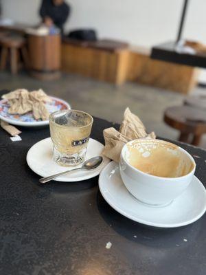 Cortado and latte over turkey croissant