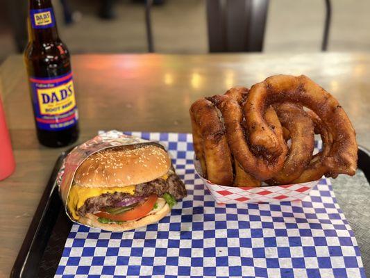 Tri motor burger. 1/2 pound with cheese & stupid large beer batter onion rings.