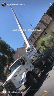 Perfect crane lift for Long Beach condo. Thank you to Purple Crane!