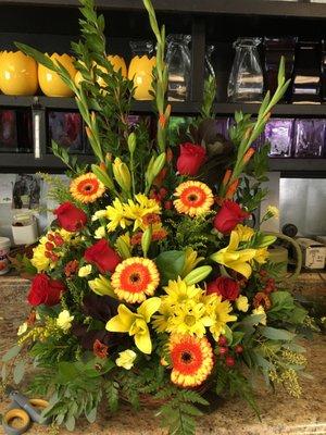 Flowers for a friend that passed who loved flowers & Halloween.  Great job Buds & Blooms.