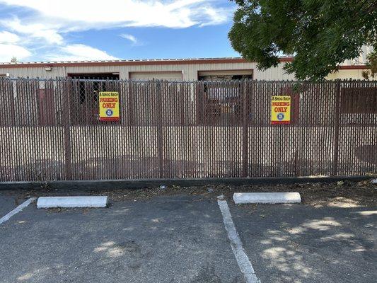 There are several shady spots right opposite the smog check station - back into one of these so you can pull right up when it's your turn.