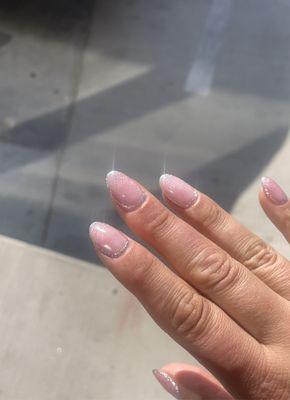 Glistening cats eye nails outside in the sun