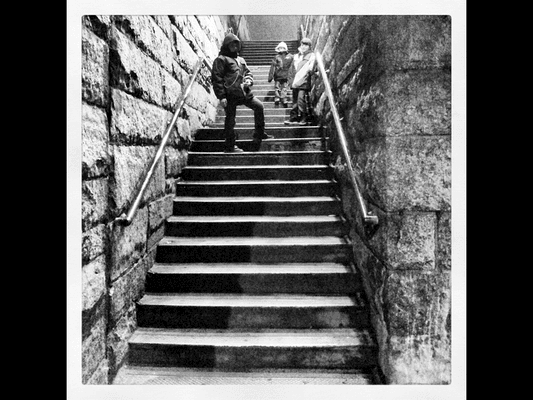 George L. Rosario loves finding fun spots to photograph his children in. This is the back entrance to the Manhattan Bridge...