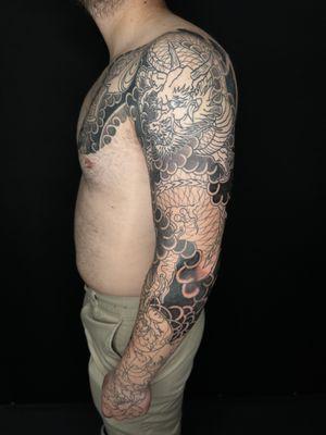 Japanese Dragon full sleeve tattoo in progress by the owner Koji